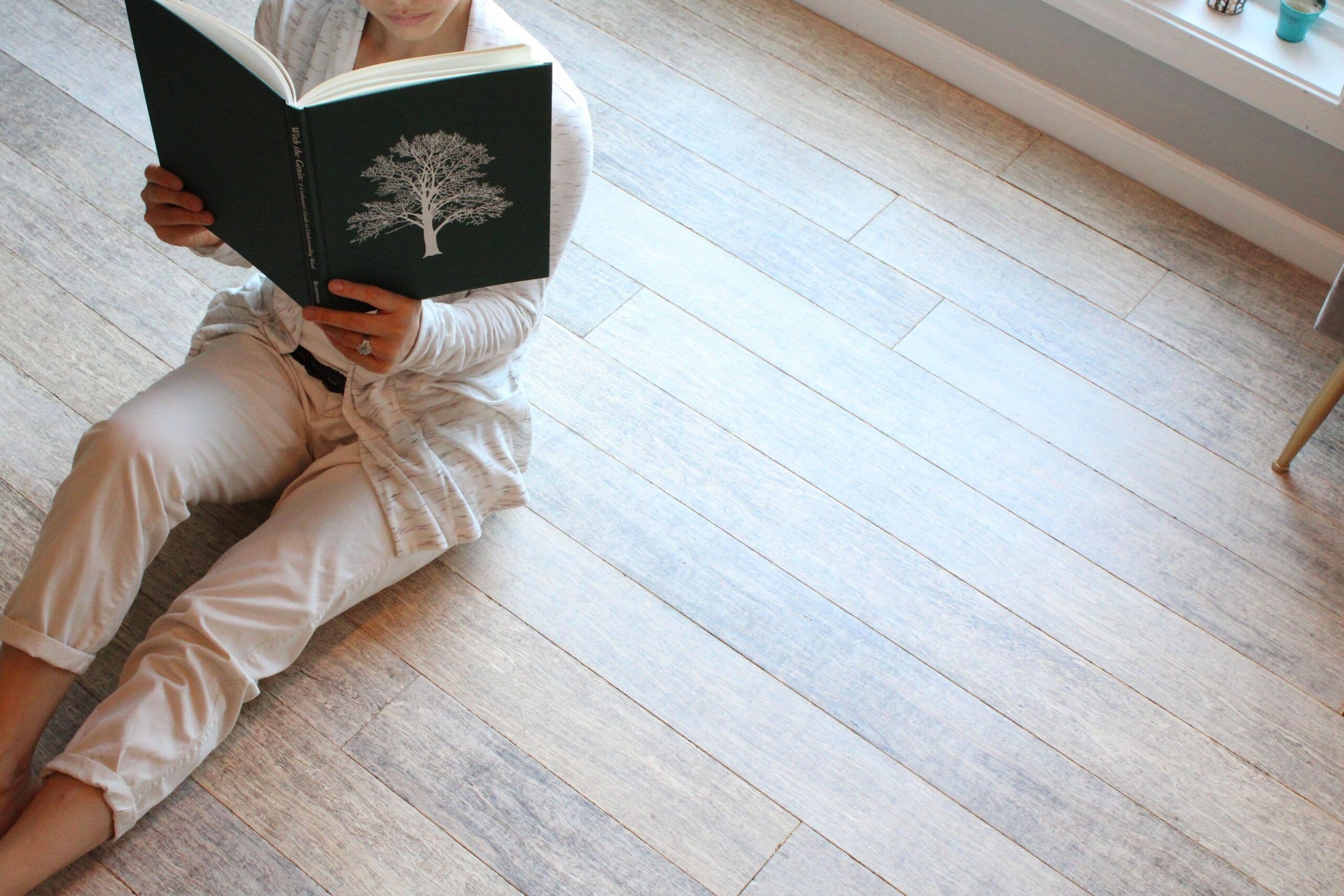 Person Reading on Hemp Flooring